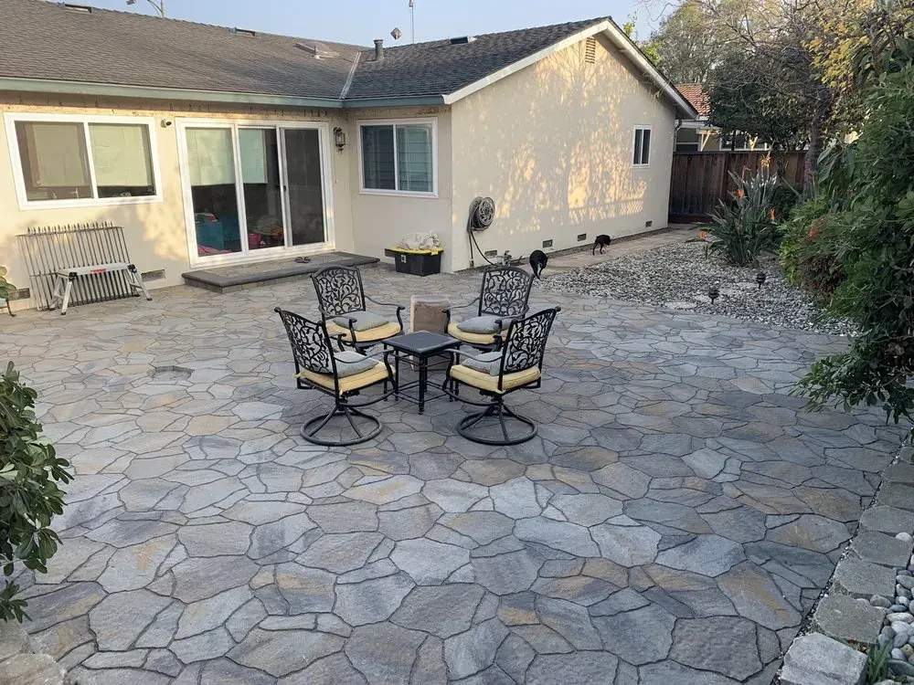 Flagstone patio with outdoor dining set